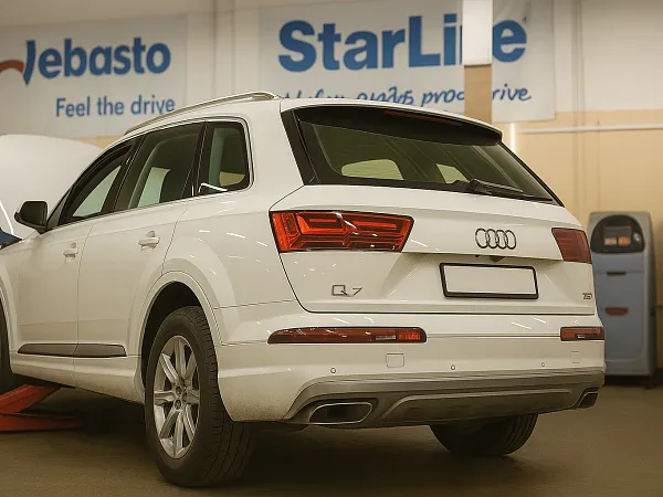 Установка электромеханических замков капота на Audi Q7
